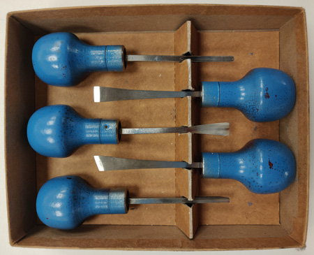 Set of five cheap carving tools with palm handles
